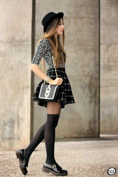 Black and white polka dot blouse with check mini skater skirt