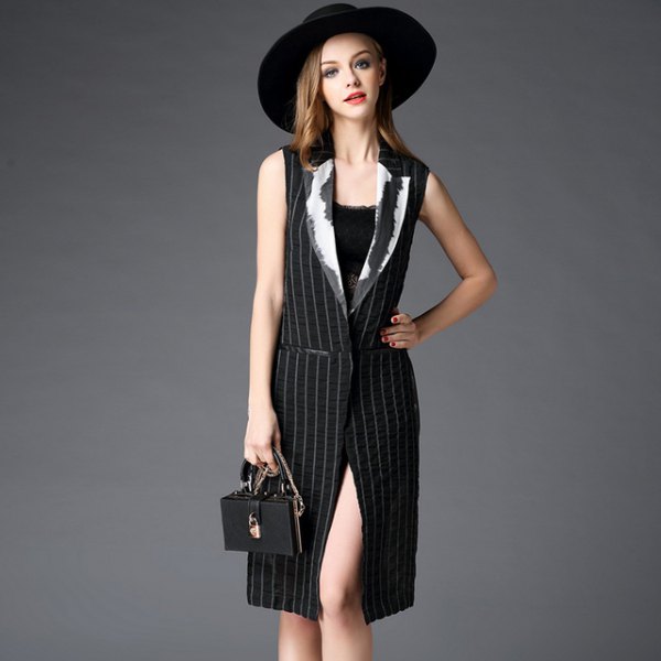Black and white striped, knee-length waistcoat dress with belt and felt hat