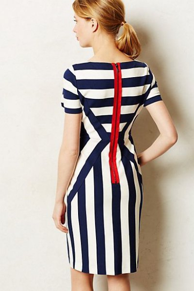 Black and white striped knee length dress with back zip closure
