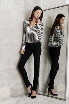Black and white striped long-sleeved blouse with chinos