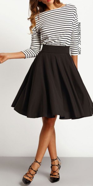 Black and white striped long sleeve t-shirt with knee length skater skirt