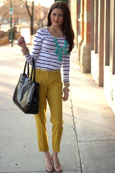 Black and white striped long sleeve t-shirt with mustard colored cropped trousers
