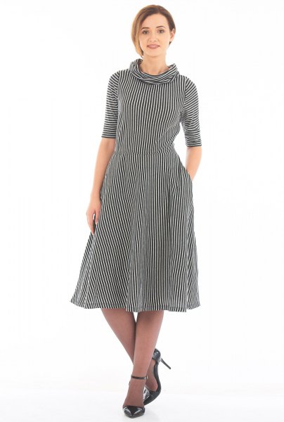 Black and white striped fit and flare dress with a high neck and half sleeves