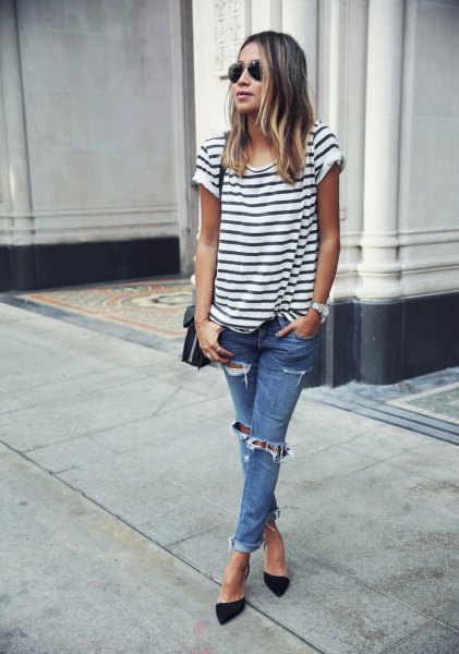 Black and white striped short sleeve t-shirt with blue jeans and high heels