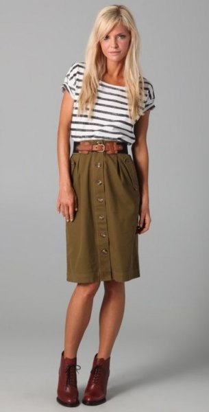 Black and white striped t-shirt with high waisted olive green knee length skirt