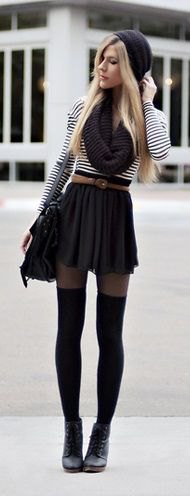 Black and white striped t-shirt with belted mini skater skirt and tights