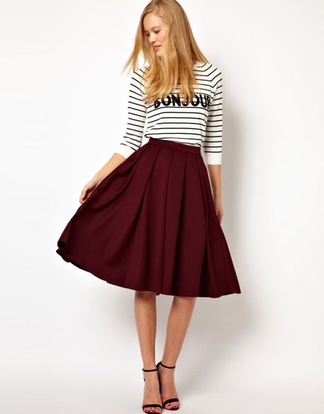 Black and white striped three quarter top with burgundy skater midi skirt