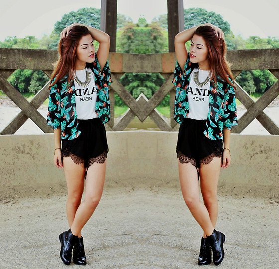 Black and white tribal print cardigan paired with scalloped high rise shorts