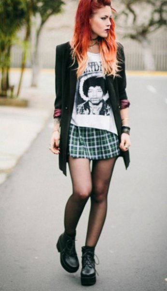 Black blazer with white graphic tee and plaid mini skirt