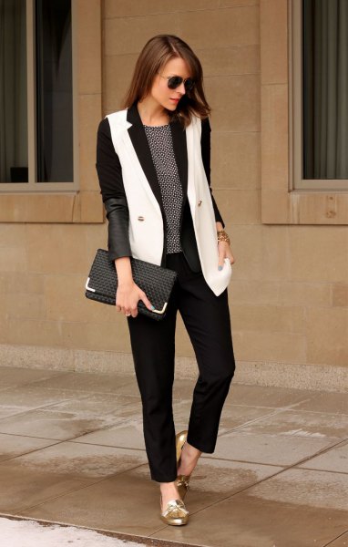 Black blazer with white long waistcoat and gold metallic slippers