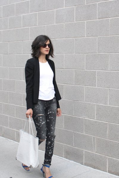 black blazer with white t-shirt and painted blue cuffed jeans