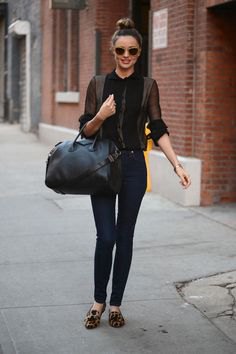 Black blouse with dark gray fitted cardigan and leopard print
ballet flats
