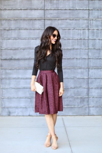 Black button down shirt and pleated wool midi skirt