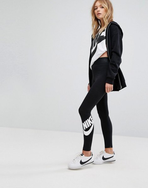 Black cardigan with white printed t-shirt and high-waist Nike leggings
