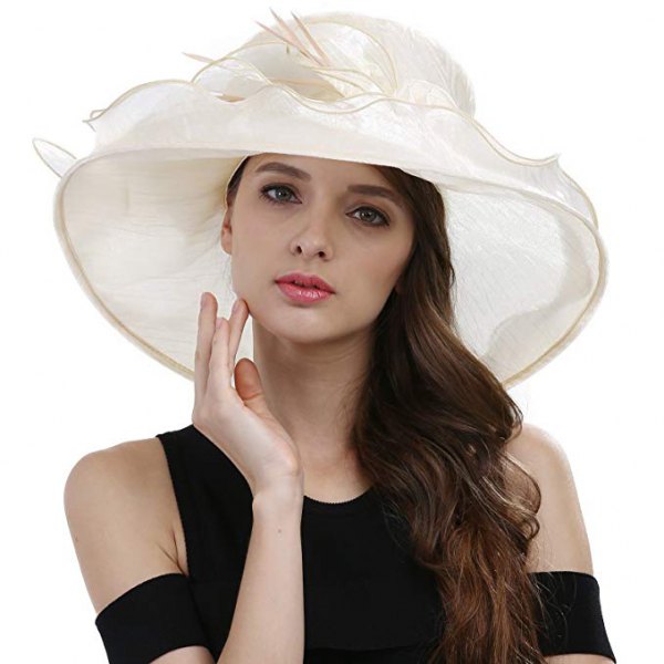 Black strapless midi shift dress with white feather church
hat