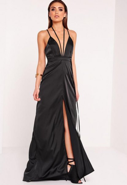Black maxi dress with a deep V-neckline and a high slit
