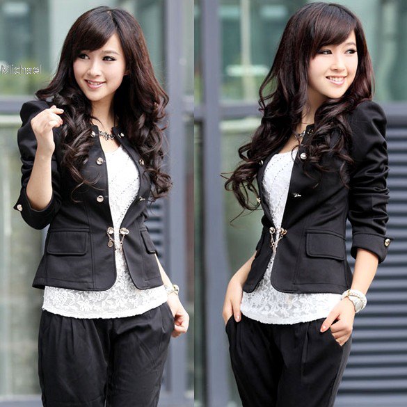 Black fitted cotton blazer with a lace top and loose fitting trousers