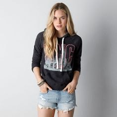 Black graphic hoodie with light blue mini jean shorts