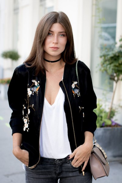 Black collared jacket and deep V-neck tank top