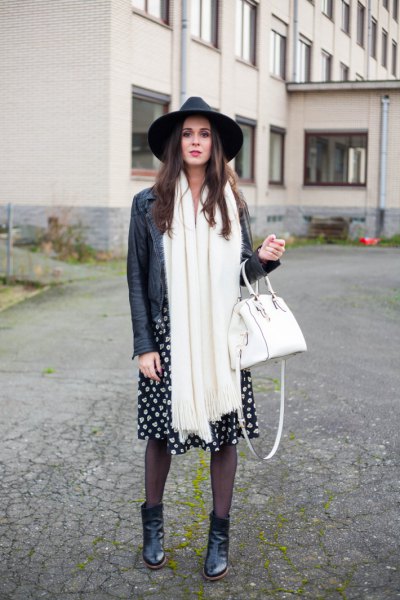 black leather cap with biker jacket and long white scarf