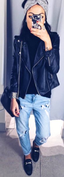 Black leather jacket with boyfriend jeans and royal blue loafers