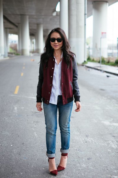 Black leather jacket with buttoned shirt and burgundy pointed toe dress shoes