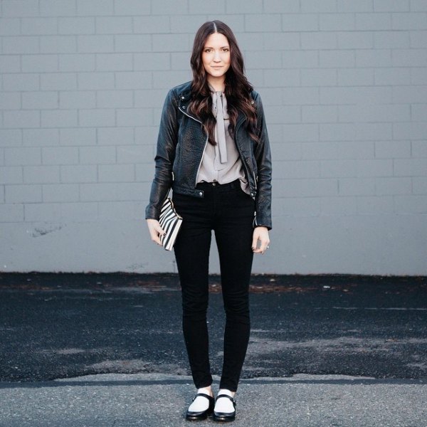 black leather jacket with gray blouse and ballerinas