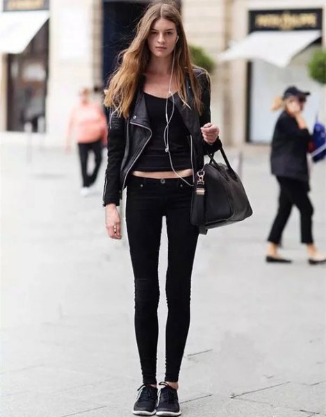 Black leather jacket with scoop neck crop top and skinny jeans