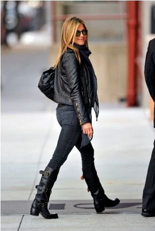 Black leather jacket with skinny jeans and knee-high motorcycle
boots