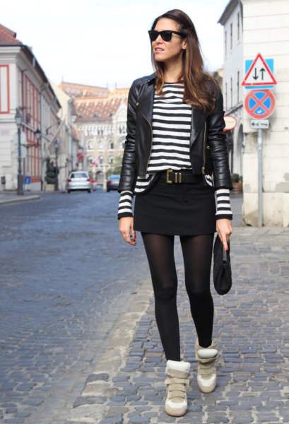 black leather jacket with striped t-shirt and mini skirt