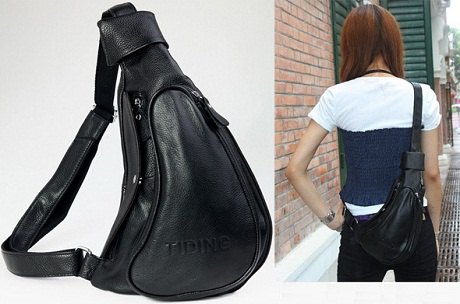 Black leather shoulder bag with white and dark blue t-shirt and jeans