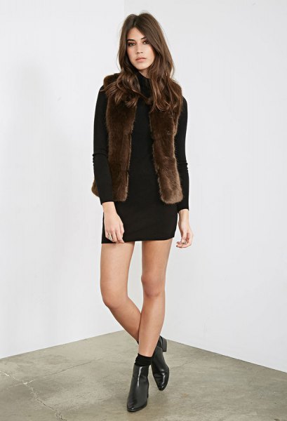 Black long sleeve mini shift dress with dark brown faux fur waistcoat
