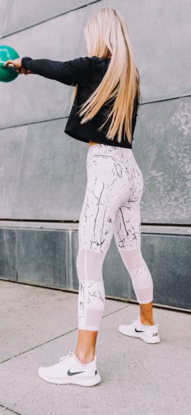 Black long sleeve t-shirt with white printed high waisted fitness leggings