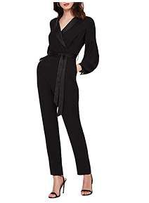Black long sleeve wrap jumpsuit with ankle straps and an open toe