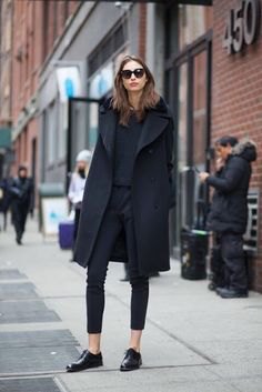 black long wool coat with skinny jeans and leather boots