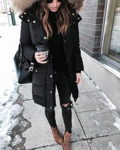 black, long down coat with light gray faux fur hood