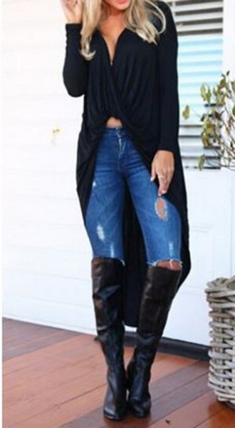 Black maxi cardigan sweater with a low-cut crop top and over-the-knee boots