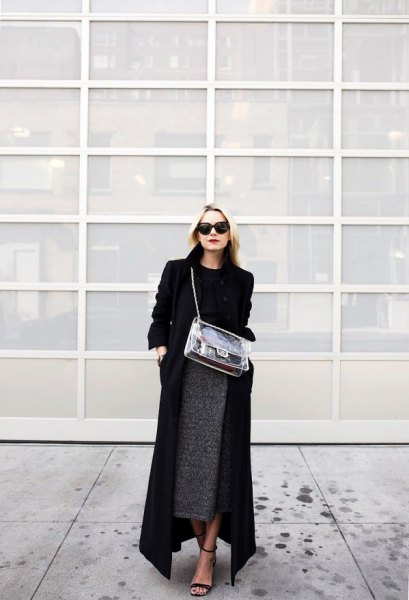 Black maxi coat with sweater and heather midi skirt