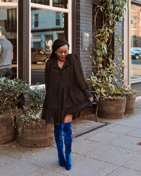 Black mini ruffle long sleeve dress with blue velvet overknee boots