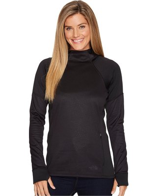Black long-sleeved sweater with a stand-up collar and matching jeans