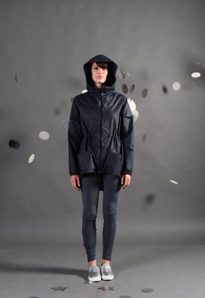 black nylon jacket with gray running tights