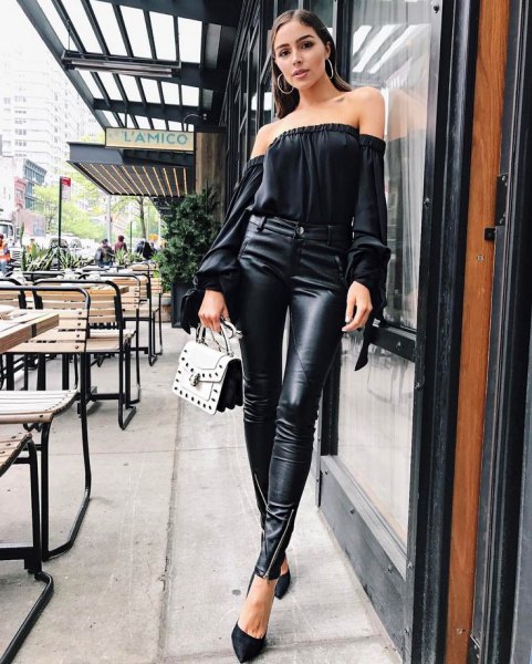 Black strapless blouse with high-rise leather leggings