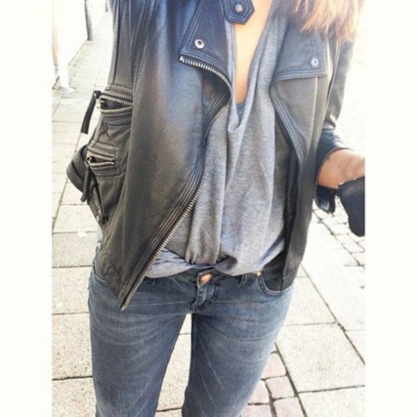 black oversized leather jacket with gray draped top and slim fit jeans