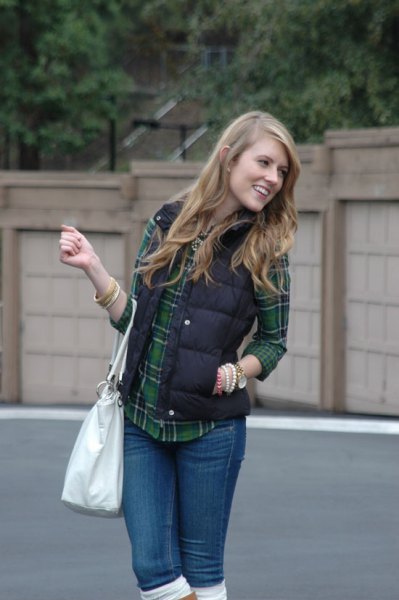 black quilted waistcoat with gray and navy check boyfriend
shirt