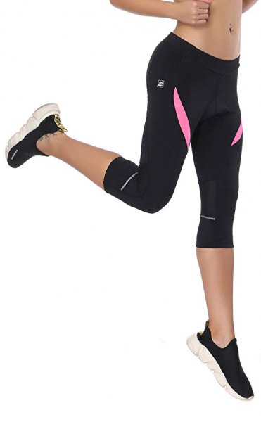 Black running tights with a pink crop top