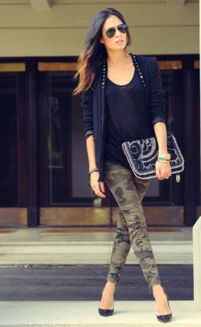 Black vest top with a scoop neckline, blazer and cropped camo
jeans