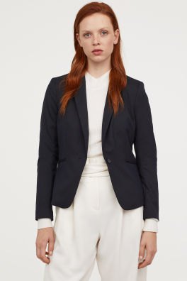 black cropped tailored blazer with white relaxed fit high rise pants