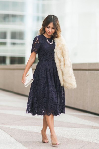 Black lace short sleeve flared midi dress with a white faux fur coat