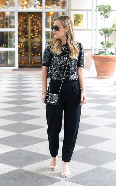 Black glitter top with matching chinos and white sandals
