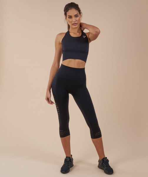 Black sports bra top with short running tights